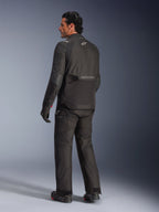 Alpinestars Andes V4 Drystar® Jacket, Black, back view of rider in complete motorcycle gear, textile adventure jacket featuring Alpinestars branding on the back, worn with matching black pants and boots, all-weather road and adventure riding style