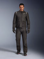 Male model wearing the Alpinestars Andes V4 Drystar® Jacket in Black, paired with matching adventure motorcycle pants, black gloves, and black boots, full-body studio shot showcasing technical all-weather touring gear with Alpinestars branding.