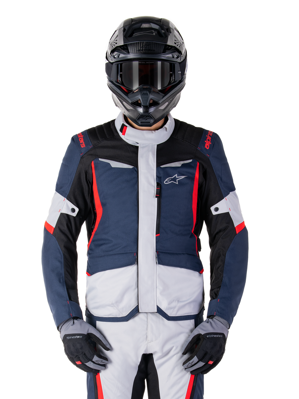 Alpinestars ST-1 Waterproof Jacket, motorcykeljacka, blå med röda och vita detaljer, vattentät, skyddande design med logotyp på bröstet, visad på förare med hjälm och handskar