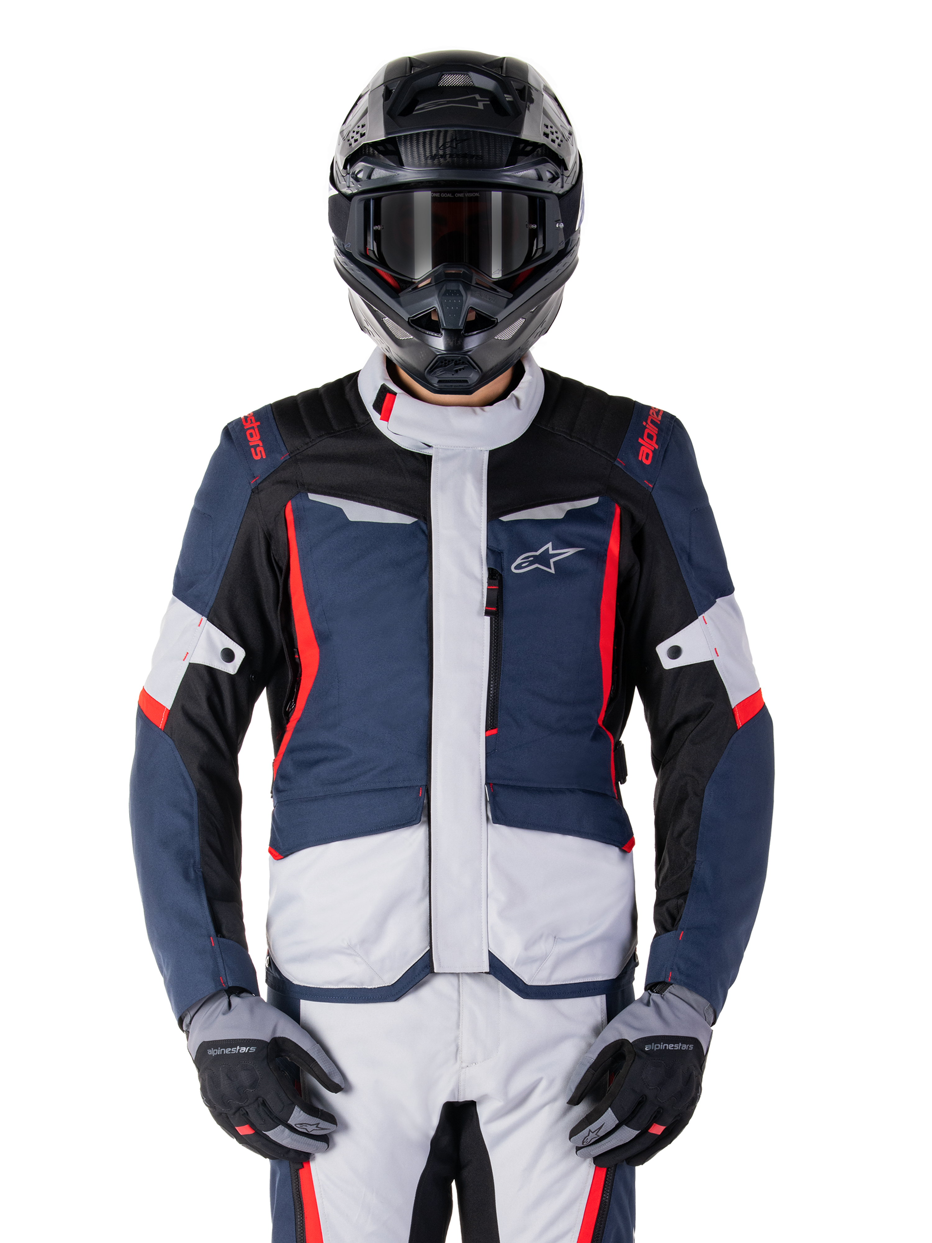 Alpinestars ST-1 Waterproof Jacket, Adventure Touring Jacket, Dark Blue Black and Bright Red, worn with a black adventure helmet and grey gloves, featuring light grey panels and red accents on shoulders and zippers, sleek design with Alpinestars branding on chest, durable waterproof gear for motorcycle riding