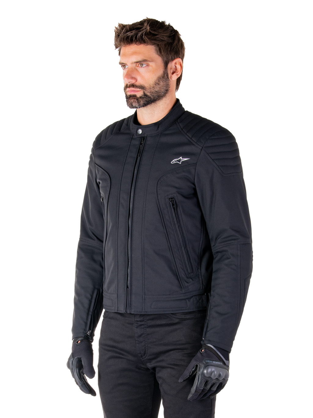Alpinestars Clayton WR Jacket, Black, urban textile motorcycle jacket with quilted shoulder and forearm details, slim-fit design, matte finish, worn by a rider with black gloves.