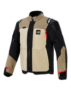 Alpinestars Andes Pro Drystar® XF-jacka, äventyrsmotorcykeljacka, färgkombination i Walnut och Aluminum, tan- och svart textilkonstruktion med röda detaljer, stora praktiska bröstfickor, 'All Terra'-logotyp på bröstet och förstärkta axelpaneler.