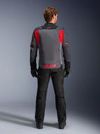 Alpinestars ST-2 Air Jacket, Deep Gray Dark Gray and Bright Red, rear view worn by a rider with black pants and gloves, featuring large mesh ventilation panels and red Alpinestars logo on the lower back, modern summer touring design