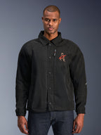 Alpinestars Revved WR Jacket, Black Motorcycle Jacket, featuring a shirt-style collar and snap-button front, red embroidered 'A' logo on chest, vertical zippered chest pocket, elastic cuffs, urban coaches jacket design