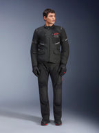 Alpinestars Andes Air Drystar® Pants, Motorcycle Touring Pants, Black, featuring mesh ventilation panels and a red logo on the leg, worn as part of a complete riding outfit with a matching jacket and gloves, professional adventure touring gear