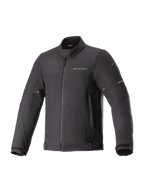 Alpinestars Husker Waterproof Jacket, Black urban motorcycle jacket, high-density softshell fabric, high collar with snap button, full-zip front, adjustable waist and cuff straps, subtle chest branding and reflective sleeve accents.