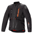 Alpinestars AMT-10R Drystar XF-jacka, svart och orange, motorcykeljacka för äventyrstouring, grå axelpartier, flera dragkedjor med orange dragtappar, justerbara remmar, rött innerfoder, teknisk skyddsutrustning