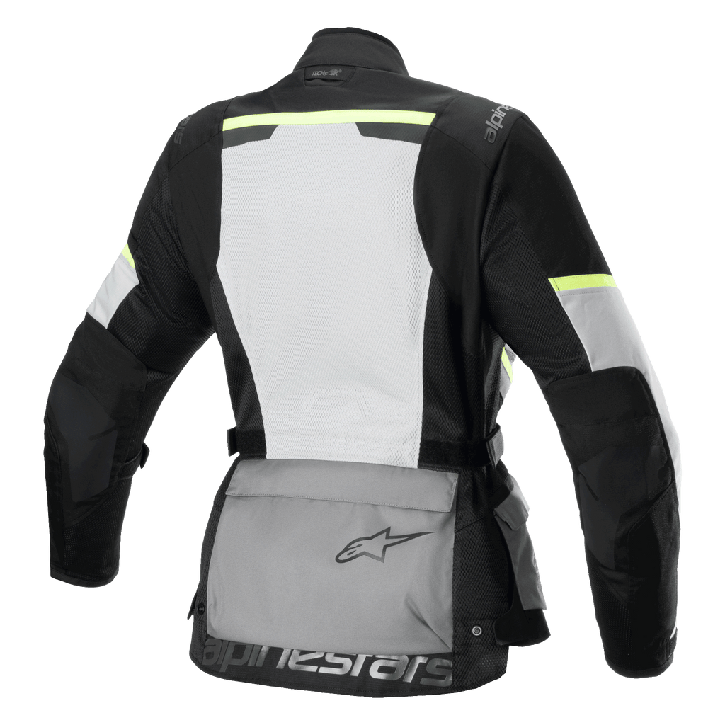 Alpinestars Stella Andes Air Drystar® jacka, touringjacka för dam, sedd bakifrån, Ice Gray, Dark Gray och svart, med en stor vit ryggpanel i mesh, grå förvaringsficka bak med logotyp, gula hi-viz-detaljer och textilkonstruktion för luftflöde och skydd.