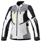Alpinestars Stella Bogota Pro Drystar jacka för damer, touringjacka för motorcykel, isgrå och mörkgrå med vita och neongula detaljer, vattentät textilkonstruktion med justerbara remmar och ventilationsdragkedjor, frontvy på vit bakgrund
