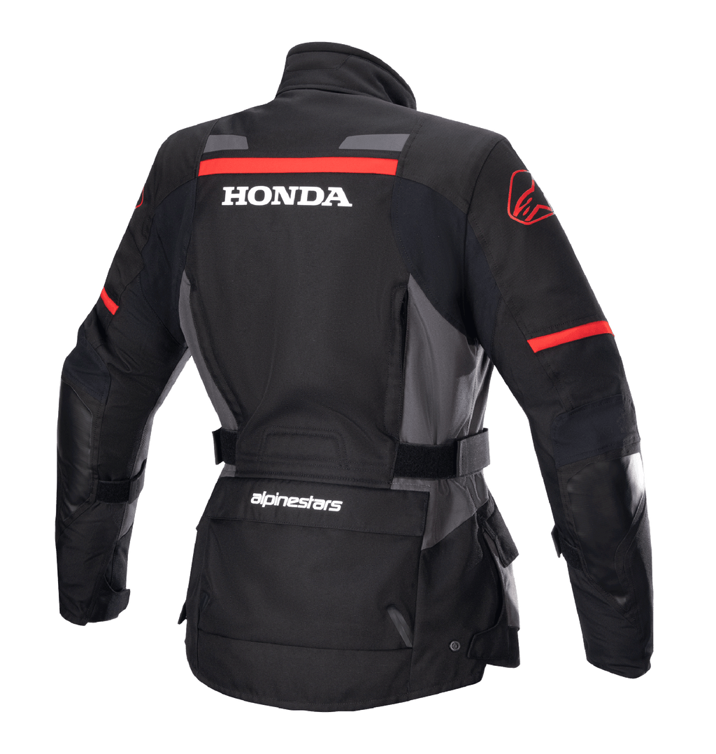 Alpinestars Stella Honda Andes V3 Drystar® jacka för dam, motorcykeljacka för äventyr, svart, grå och klarröd, vy bakifrån med framträdande vit HONDA-logotyp och röd Alpinestars-grafik, vattentät textilkonstruktion med justerbar midja och praktiska fickor
