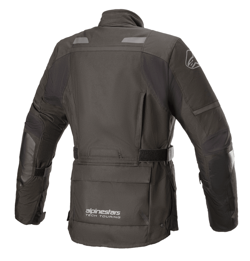 Alpinestars Stella Andes V3 Drystar® damjacka, svart och mörkgrå, baksida med vattentät textilkonstruktion, stor förvaringsficka på nedre delen av ryggen, justerbar midjerem och reflekterande säkerhetsdetaljer.