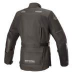 Alpinestars Stella Andes V3 Drystar® damjacka, svart och mörkgrå, baksida med vattentät textilkonstruktion, stor förvaringsficka på nedre delen av ryggen, justerbar midjerem och reflekterande säkerhetsdetaljer.
