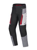 Alpinestars Honda ST-1 vattentäta byxor, motorcykelbyxor för touring, isgrå, mörkgrå och svarta med röda detaljer, teknisk textilkonstruktion med vattentätt foder, cargofickor med dragkedja och ergonomiska förböjda ben