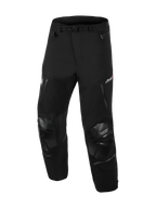 Alpinestars Andes Pro Drystar® XF byxor - Short, MC-byxor för adventure touring, svarta och mörkgrå, robust textilkonstruktion, förstärkta knäpaneler med texturerad finish, justerbart midjebälte med spänne, ventilationsöppningar med dragkedja, Drystar® XF-logotyp, slitstark MC-utrustning för alla väder