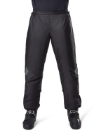 Alpinestars Bogota Pro Drystar 3 Seasons Pants, Waterproof Motorcycle Pants, Black, lightweight technical fabric with reflective knee patches, worn as over-pants with black riding boots, designed for adventure touring weather protection
