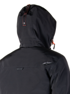 Alpinestars Mootant Waterproof Parka, Motorcycle Jacket, Spicy Orange and Black, featuring a modular 4-season design with a removable hood, utilitarian military style, and waterproof textile construction for all-weather riding.