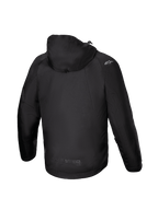 Alpinestars Morush vattentät parka, svart motorcykeljacka för herr, vy bakifrån med stormsäker huva och raglanärmar.