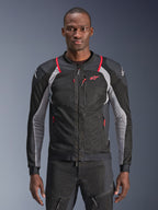 Alpinestars Troop-Air Pro Jacket, Black Ash Gray and Bright Red, worn by a model, motorcycle mesh jacket with perforated ventilation panels, featuring red zippered pockets and white shoulder logos, technical armored riding gear