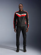 Alpinestars T-Dyno Air Jacket, Textile Motorcycle Jacket, Black Bright Red and Ecru, worn by a model with black pants and boots, featuring a vintage-inspired design with bold color stripes on the chest, star logos on the sleeves, and breathable mesh construction for urban riding.