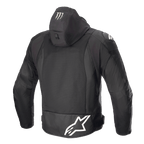 Alpinestars FQ20 Zaca Air Monster Jacka, motorcykeljacka i textil, svart och vit, vy bakifrån som visar en stor vit Alpinestars-logotyp på nedre ryggen, Monster Energy-klomärke på huvan, ventilationspaneler i 3D-mesh och DFS Lite-axelsliders.