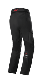 Alpinestars AMT 7 Air Pants, Adventure Touring Motorcycle Pants, Black Dark Shadow, rear view with red Alpinestars logo on the waistband, featuring MATRYX ventilation panels and stretch zones for airflow and comfort.