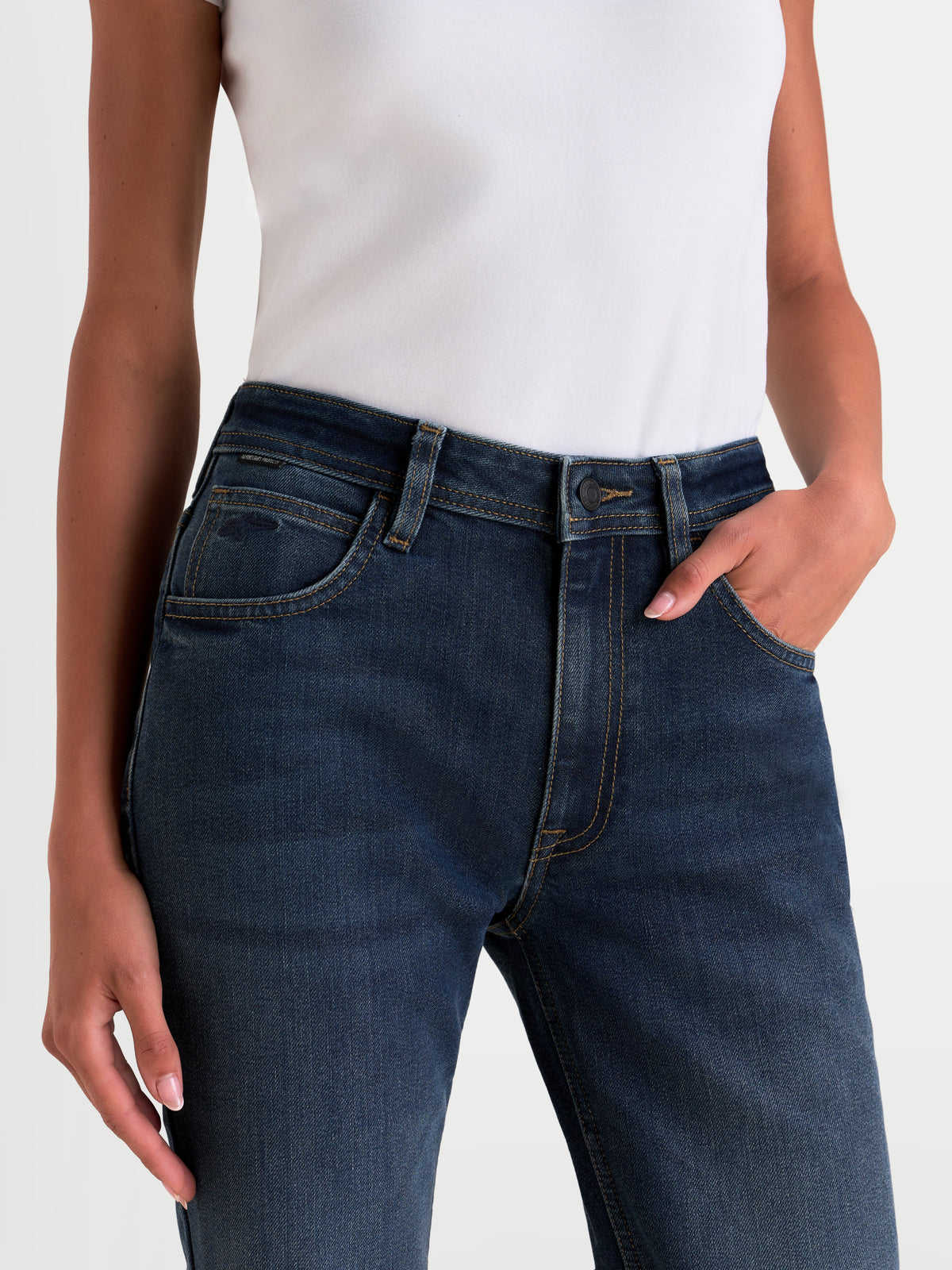 Alpinestars Stella Flex-AST 5 Denim Pants, women's urban motorcycle jeans in indigo washed, close-up shot of waist and pocket details worn by a model