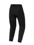 Alpinestars Stella Flex-AST Explorer-byxor, motorcykelbyxor för damer, svarta, vy bakifrån som visar stretchig textilkonstruktion, elastisk midja med bältesöglor och långa dragkedjor på underbenen för äventyrskörning.