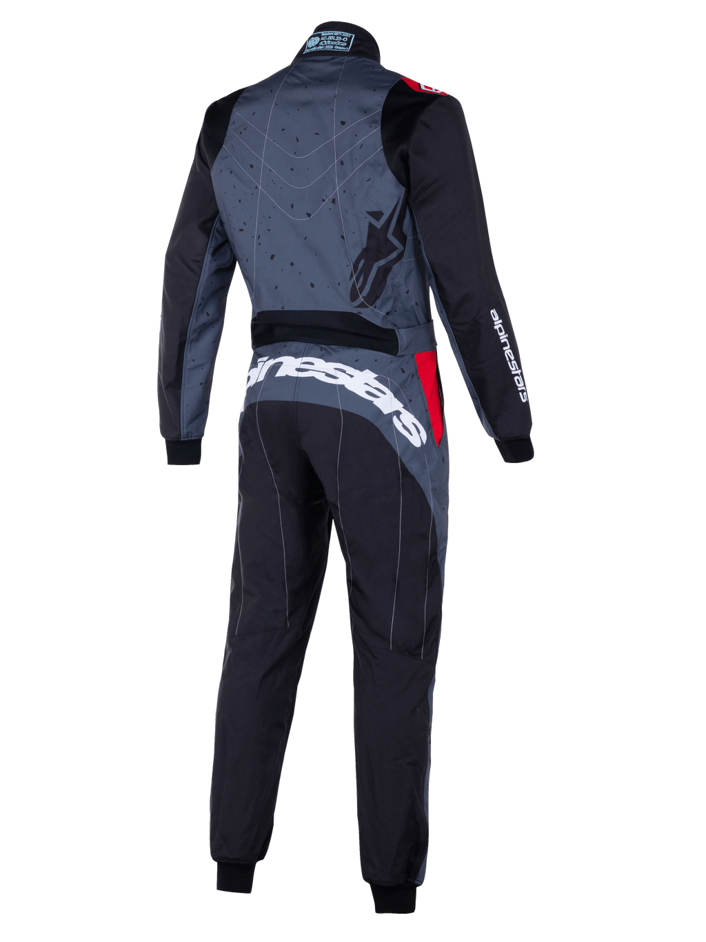 Alpinestars KMX-9 V3 Graphic 6-dräkt, grå och svart kartingoverall med röda detaljer, baksida med grafiskt mönstrat ryggparti, tydlig vit Alpinestars-logotyp över ländryggen och ergonomiska paneler för motorsportprestanda.