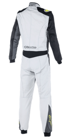 Alpinestars Atom FIA Suit, Auto Racing Suit, Silver, Anthracite and Yellow Fluo, rear view showing black sleeves and waist panel, Alpinestars branding on lower back, yellow star logos on lower legs, FIA certified motorsport apparel
