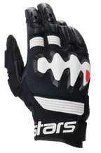 Alpinestars Halo Leather Gloves, Adventure Motorcycle Gloves, Black and White, featuring a large white over-injected knuckle protector, perforated leather panels for airflow, and a short cuff with bold white branding.
