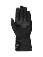 Alpinestars Wt-1 Drystar® isolerade handskar, motorcykelhandskar, svarta, vy av handflatan med förstärkta greppytor i textil, lång krage med vit Alpinestars-logotyp på remmen, väderbeständig konstruktion för vägkörning