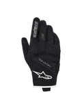 Alpinestars Stella Moblast vattentäta handskar, motorcykelhandskar för dam, svarta med vit kant, vy av handryggen som visar Alpinestars-logotyp, MO.ST.EQ.-branding och mjukt knogskydd.