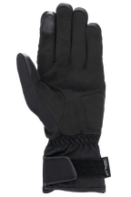 Alpinestars Women Stella SR-3 V2 Drystar® Gloves, Black, palm side view showing synthetic leather reinforcements, touchscreen-compatible index fingertip, elasticated wrist, and gauntlet cuff with adjustable Velcro strap and Drystar branding.