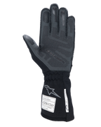 Alpinestars Tech-1 ZX V4-handskar, Black Anthracite, vy av handflata med texturerat 3D-silikongrepp, lång mudd med FIA- och SFI-certifieringsetiketter, professionella bilracinghandskar