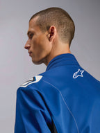 Alpinestars Kart Indoor V2 Suit, Blue karting suit, close-up side profile of the ergonomic collar and upper back with white star logo, featuring Formula 1-inspired shoulder design and durable poly-cotton twill construction