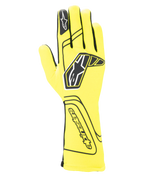 Alpinestars Tech-1 Start V4 Gloves FIA, Auto Racing Gloves, Yellow Fluo and Black, featuring a large black star logo on the back, seamless finger construction, and extended cuff for fire protection, FIA-approved motorsport gear