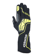 Alpinestars Tech-1 KX V4 handskar, karting-racinghandskar, Tar Gray, svart och neongul, vy av handryggen med ventilerande meshkonstruktion, stor gul Alpinestars-logotyp, vit textlogotyp på handleden, gul stjärna på pekfingret, modern sportig design