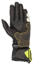 Alpinestars GP Tech V2-handskar, svarta och neongula, vy från handflatan som visar konstruktion i känguruläder, förstärkta grepp-paneler med gula sömmar, ergonomisk manschett med neongula skydd och 'SAFE RETENTION'-rem, professionell racingutrustning för motorcykel