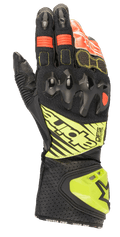 Alpinestars GP Tech V2 handskar, motorcykelracinghandskar, svarta med detaljer i gul fluo och rött, med hårt knogskydd, perforerad lädermanschett med DFS-logotyp och dragspelspaneler för optimal flexibilitet.