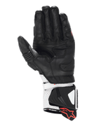 Alpinestars GP Pro R4-handskar, racinghandskar med lång manschett, svarta och vita, vy från handflatan som visar högpresterande läderkonstruktion, perforerad manschett med hårda glidskenor och röda logotypdetaljer