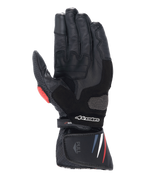 Alpinestars Honda SP-8 V3-handskar, motorcykelhandskar, svarta med röda och blå detaljer, vy av handflatan som visar konstruktion i fullnarvigt läder, förstärkt handflateglidare, perforerade detaljer och förlängd manschett med Alpinestars-logotyp.