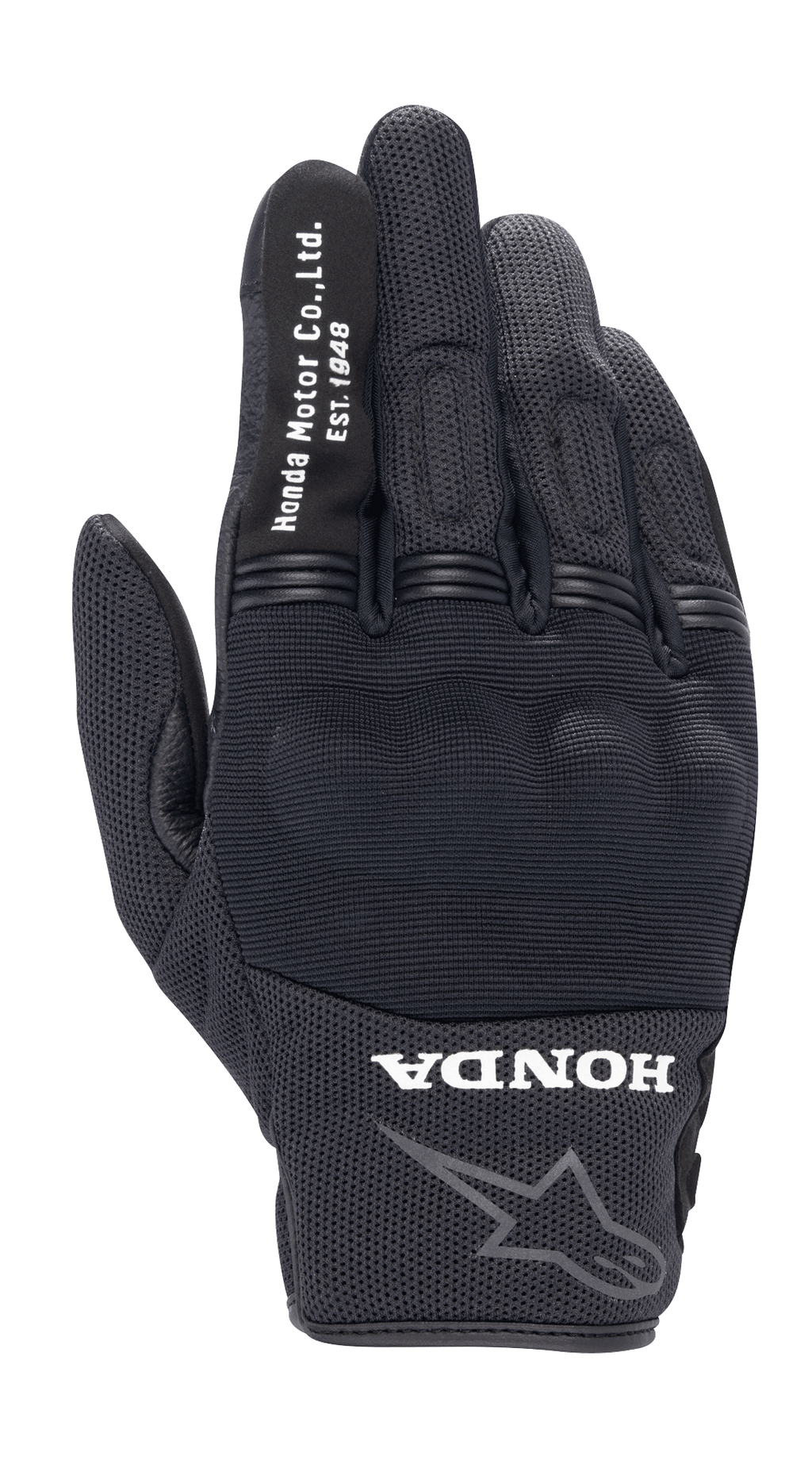Alpinestars Honda Copper Glove, svart urban motorcykelhandske, texturerad mesh-konstruktion, vit text 'Honda Motor Co. Ltd. Est. 1948' på pekfingret, 'HONDA'-logotyp och Alpinestars-stjärna på handleden, hårt knogskydd, lätt utrustning för landsvägskörning