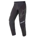 Alpinestars 2021 Techstar Phantom Pants, Motocross Pants, Black with White accents, featuring a large outlined star logo on the thigh, ASTARS branding on the knees, technical rip-stop fabric with perforated zones, and 3D Babel knee construction for off-road racing performance.