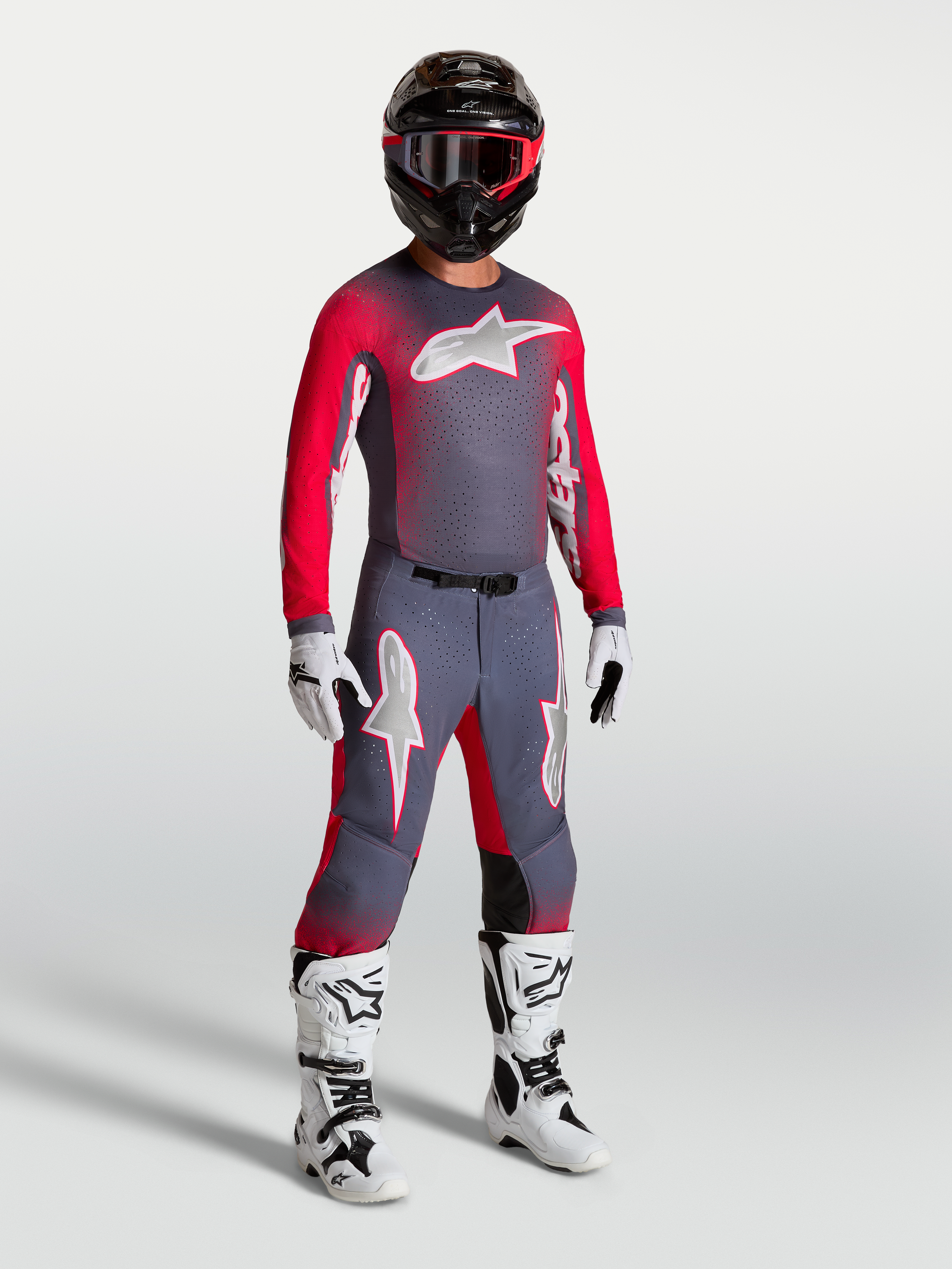 Alpinestars Supertech Hiten AFD gear set och byxor, motocrossutrustning för herr, grå och fluorescerande röd, racingdesign.