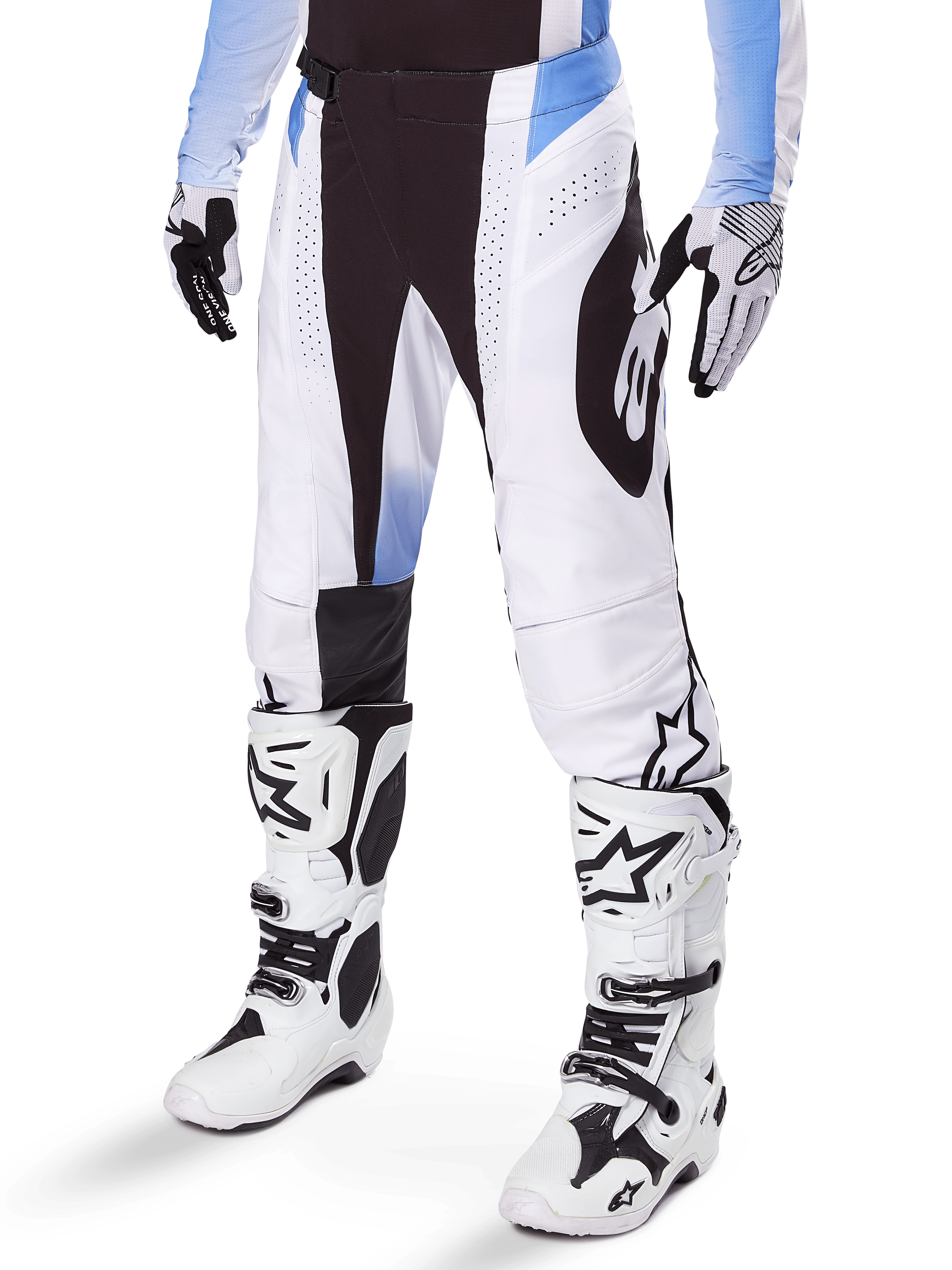 Alpinestars 2025 Techstar Melt Pants, Motocross Pants, White and Black with Blue accents, featuring laser-cut perforations for airflow and Babel knee construction, worn with matching white motocross boots and gloves, athletic off-road racing design