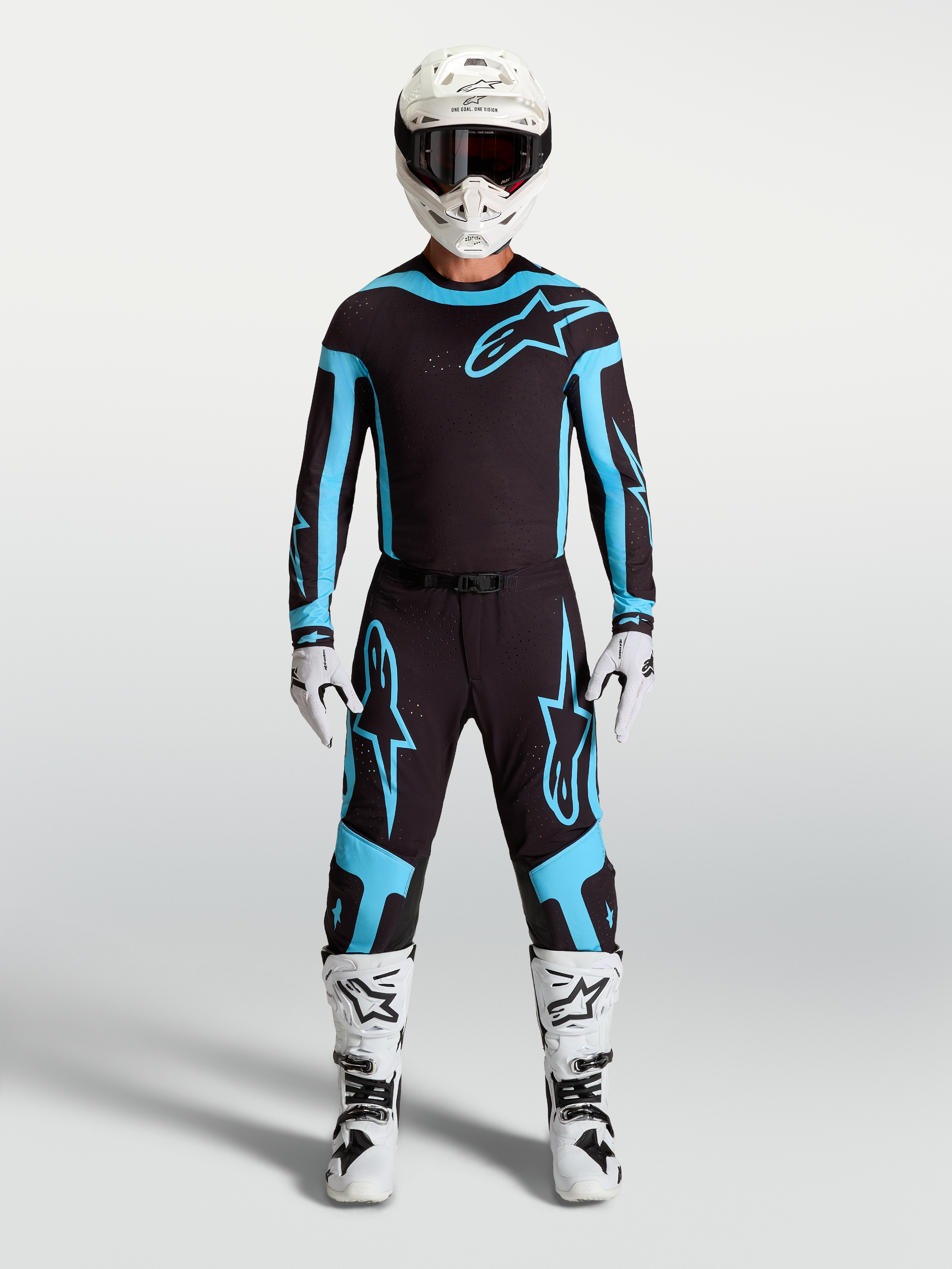 Alpinestars Supertech Vesta byxor, motocrossbyxor för herrar, svarta och turkosa, lätt stretchkonstruktion på modell