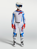 Alpinestars Supertech Vesta motocross-utrustning i ljuslila och kardinalrött, komplett set med tröja, byxor och stövlar.
