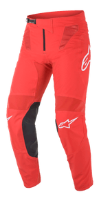 Alpinestars Supertech Blaze-byxor, motocrossbyxor, klarröda och svarta, med ventilationspaneler i mesh, innerknäförstärkningar i svart läder, vita A-star-logodetaljer och ett justerbart midjespänne för högpresterande terrängkörning