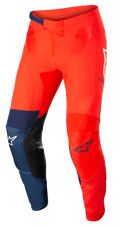 Alpinestars Supertech Blaze Pants, motocrossbyxor för terrängkörning, klarröda och mörkblå med vita detaljer, svarta läderpaneler på knänas insida, justerbart spärrspänne i midjan, vita och blå Alpinestars-logotyper, hållbar stretchkonstruktion för motocross