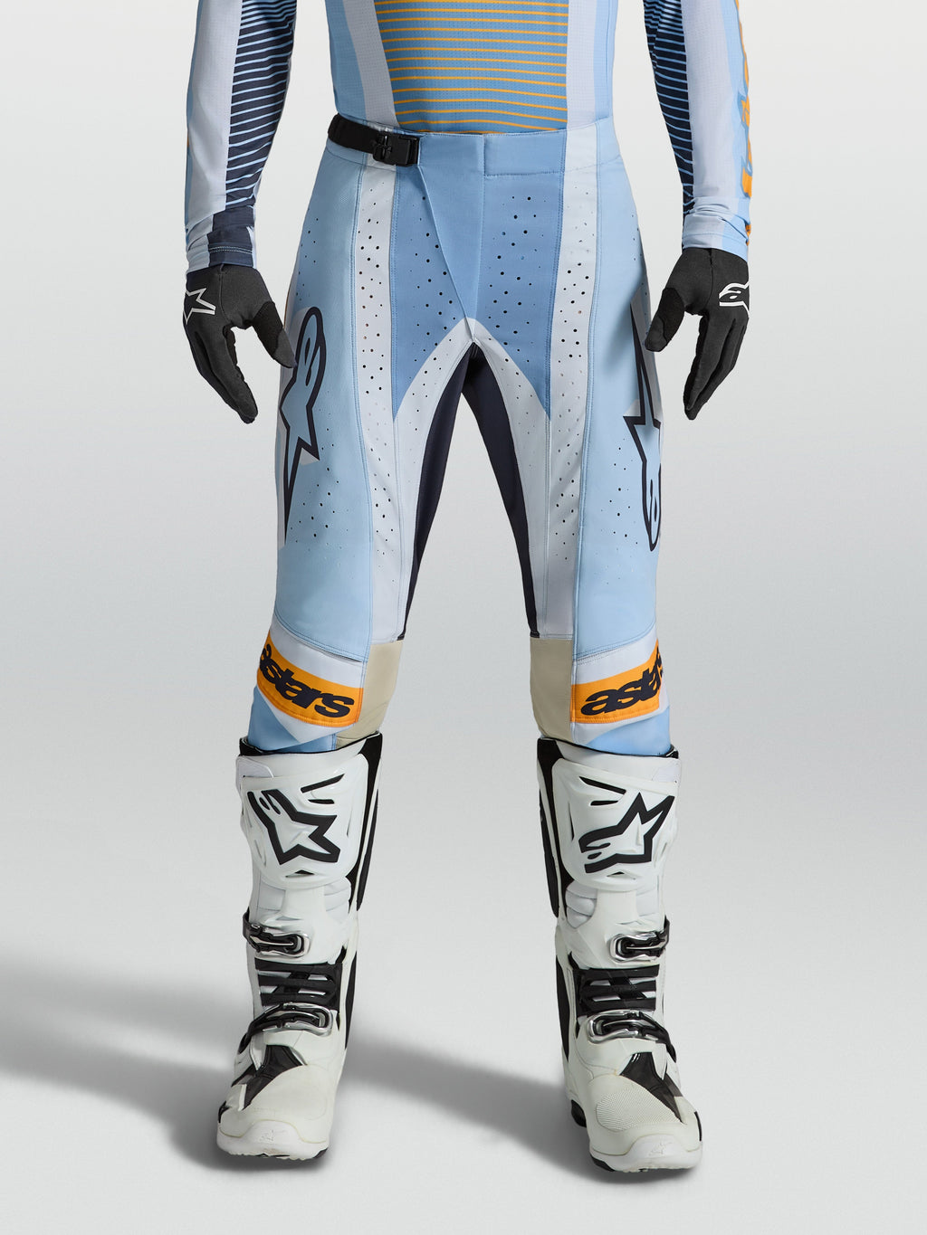 Alpinestars Techstar Maven Pants, Men's Motocross Gear in Blue and Orange with laser-cut ventilation and ergonomic race fit.